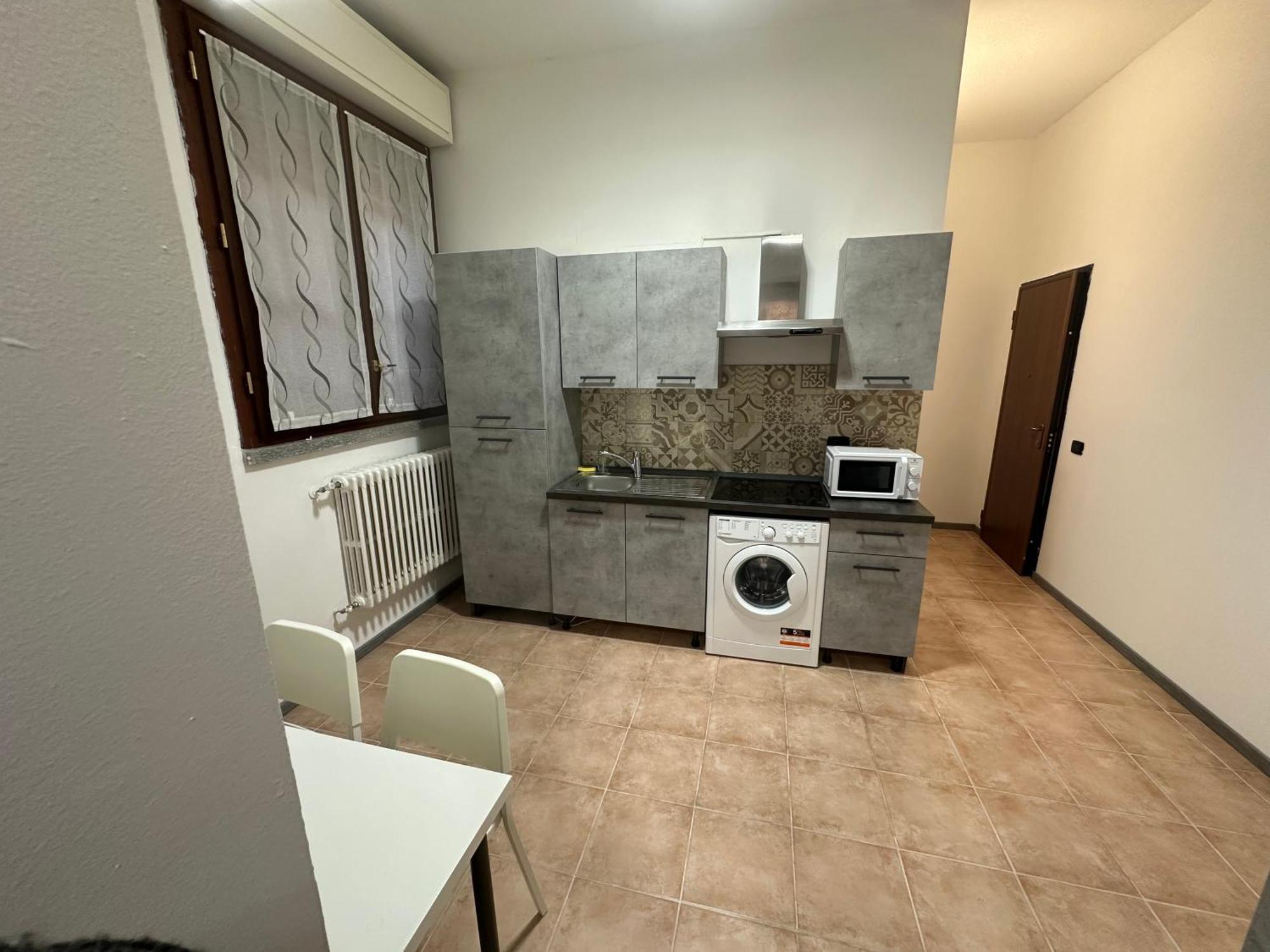 B&B Black&White And Apartments Cantu Bagian luar foto